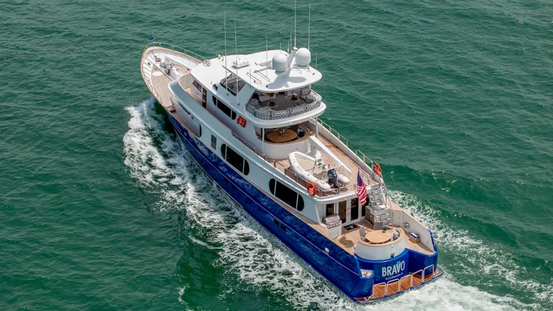 Bravo Yacht Photos Pics Aerial view of 1975 Stephens Brothers Expedition yacht cruising on the ocean.