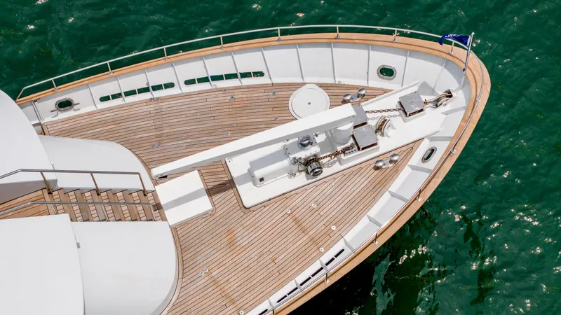 Bravo Yacht Photos Pics Aerial view of 1975 Stephens Brothers Expedition yacht deck on green water.