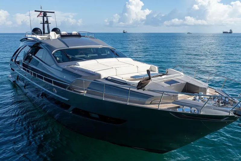 One Spin 3 Yacht Photos Pics Luxurious 2019 Pershing 9X yacht cruising on calm blue waters.