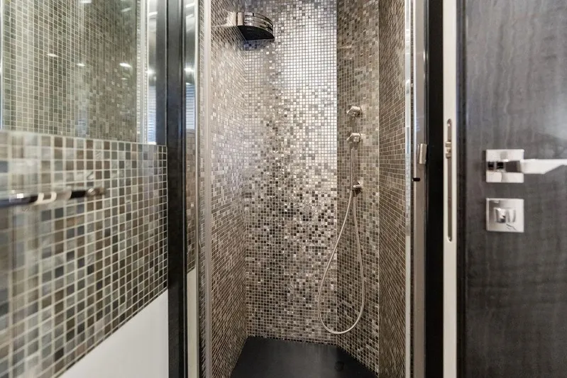 One Spin 3 Yacht Photos Pics Luxurious mosaic-tiled shower in 2019 Pershing 9X yacht bathroom.