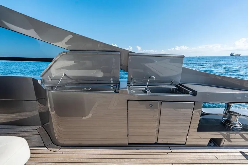 One Spin 3 Yacht Photos Pics Luxury outdoor kitchen on 2019 Pershing 9X yacht, ocean view.