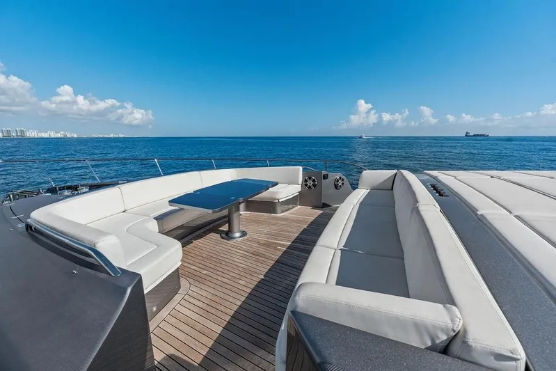 One Spin 3 Yacht Photos Pics Luxurious 2019 Pershing 9X yacht deck with elegant seating and ocean view.