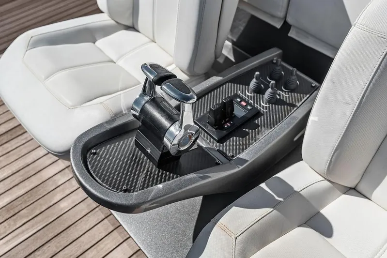 One Spin 3 Yacht Photos Pics Control panel of 2019 Pershing 9X yacht with sleek design and modern controls.