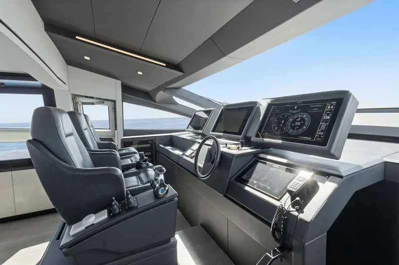 One Spin 3 Yacht Photos Pics Interior of 2019 Pershing 9X yacht cockpit with modern navigation systems.