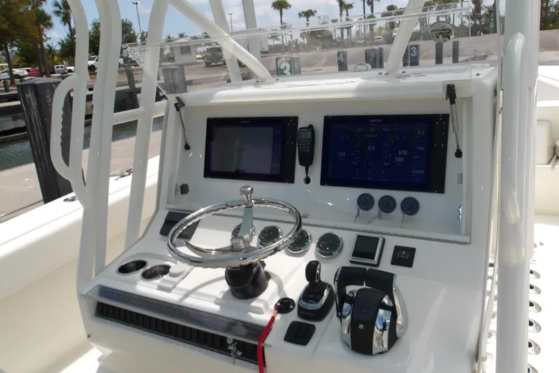  Yacht Photos Pics 2022 SeaVee 370z boat console with dual screens and steering wheel.
