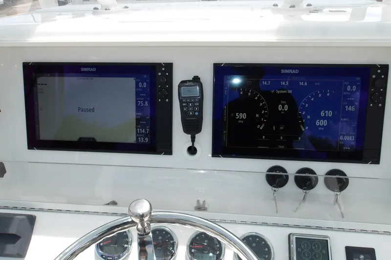  Yacht Photos Pics Dashboard of a 2022 SeaVee 370z boat with dual Simrad displays.