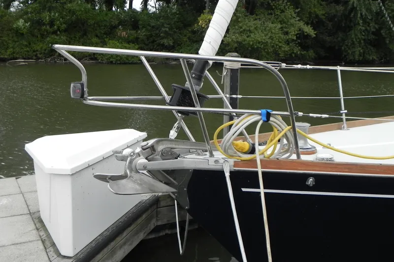 Cricket Yacht Photos Pics 1988 Tartan 40 sailboat bow with anchor and mooring lines at dock.