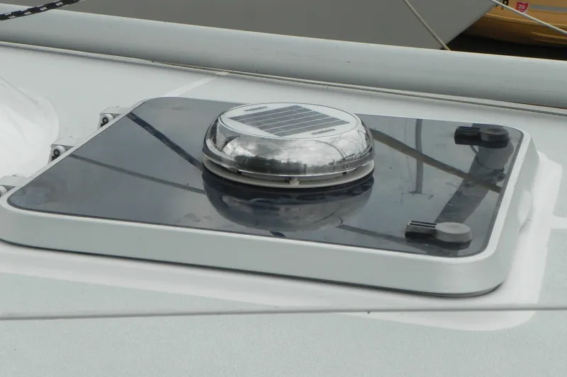 Cricket Yacht Photos Pics Solar-powered vent on 1988 Tartan 40 yacht deck.