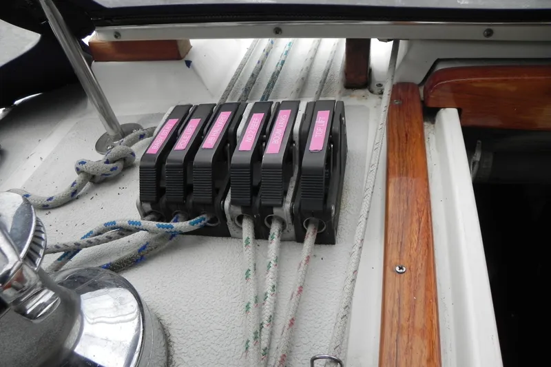 Cricket Yacht Photos Pics Close-up of 1988 Tartan 40 sailboat rope clutches and winch on deck.