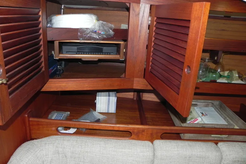 Cricket Yacht Photos Pics Interior of 1988 Tartan 40 sailboat with wooden cabinets and storage compartments.