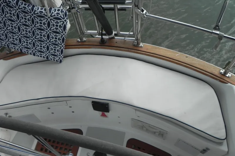 Cricket Yacht Photos Pics Cockpit seating area on a 1988 Tartan 40 sailboat with patterned cushion.