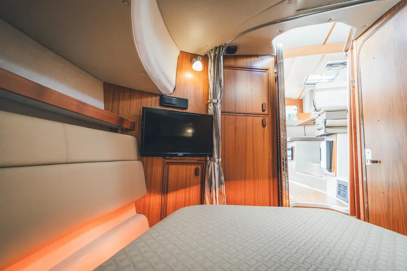 Ambraden Yacht Photos Pics Luxurious interior of 2022 Ranger Tugs R-31 CB with wood finish and modern amenities.