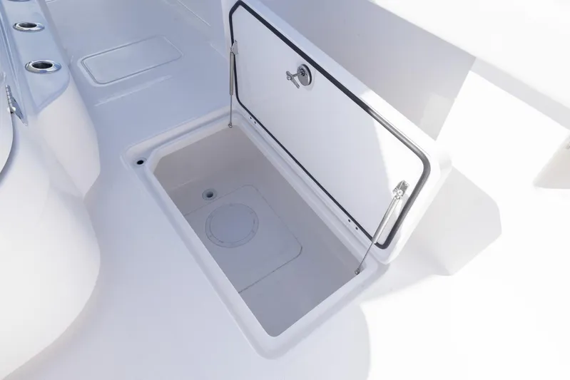  Yacht Photos Pics Open storage compartment on 2025 Invincible 35 Catamaran boat deck.