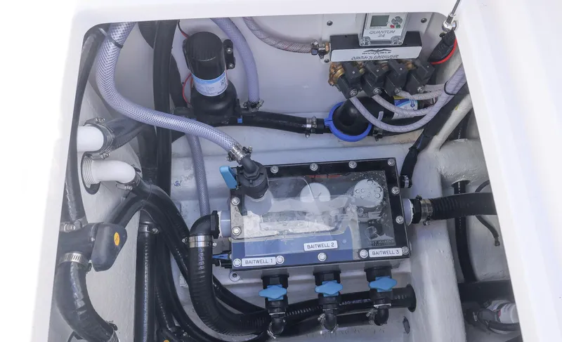  Yacht Photos Pics Engine compartment of 2025 Invincible 35 Catamaran with visible hoses and components.