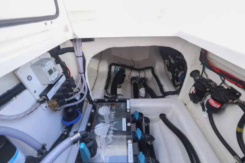 Yacht Photos Pics Engine compartment of 2025 Invincible 35 Catamaran, showcasing wiring and components.