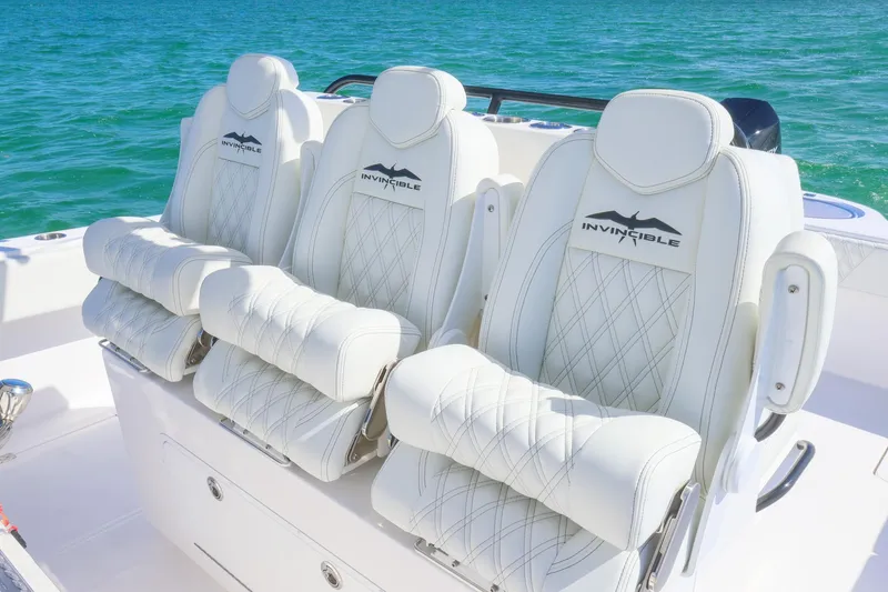  Yacht Photos Pics Luxurious seating on 2025 Invincible 35 Catamaran with ocean backdrop.