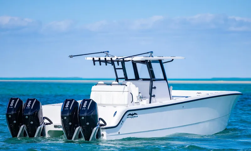  Yacht Photos Pics 2025 Invincible 35 Catamaran with triple outboard engines on open water.