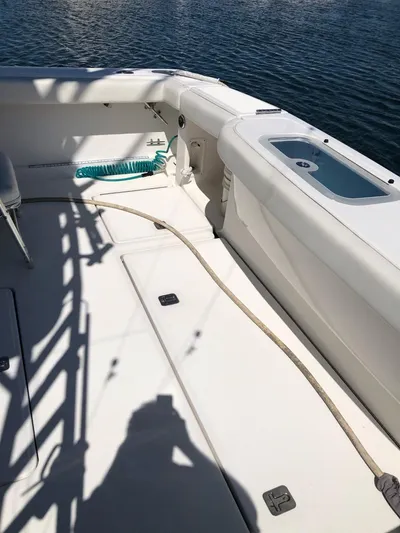 Reel Busy Yacht Photos Pics 2006 Tiara Yachts 3800 Open deck with seating and water view.