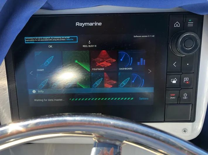 Reel Busy Yacht Photos Pics Raymarine navigation system on 2006 Tiara Yachts 3800 Open, displaying charts and fishfinder.