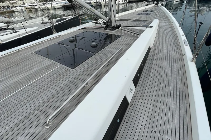  Yacht Photos Pics 2018 Hanse 588 yacht deck with sleek wood finish and modern design.
