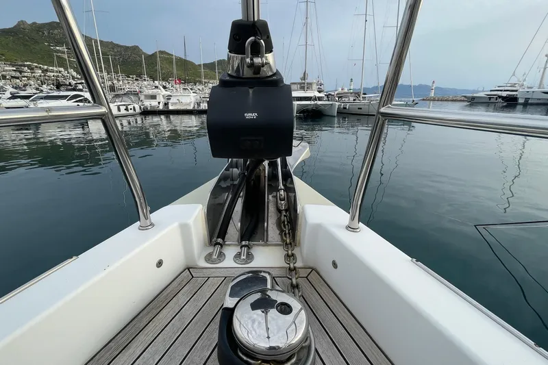 Yacht Photos Pics Bow view of 2018 Hanse 588 yacht docked in a marina.