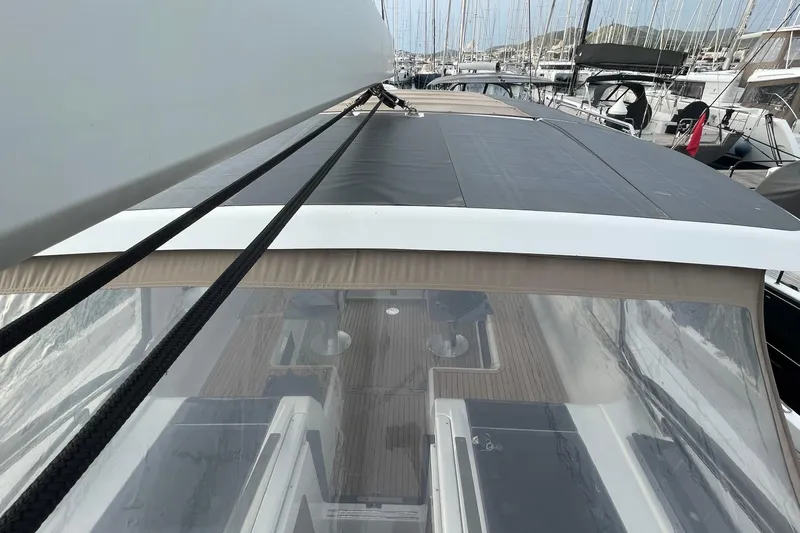  Yacht Photos Pics 2018 Hanse 588 yacht deck view with sleek design and modern features in marina setting.