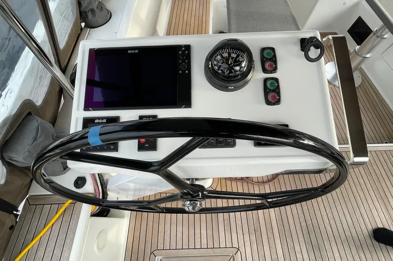  Yacht Photos Pics Steering wheel and navigation controls on a 2018 Hanse 588 yacht.