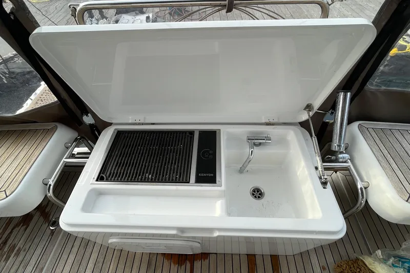  Yacht Photos Pics Outdoor kitchen on 2018 Hanse 588 yacht with grill and sink.