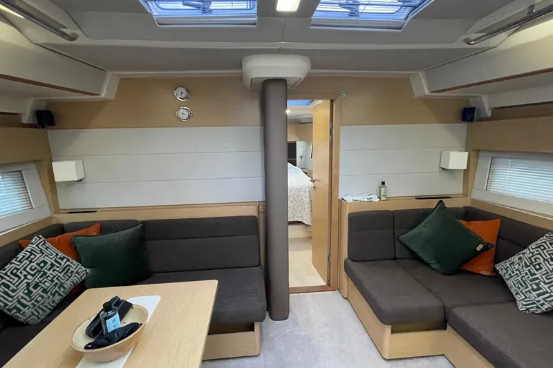  Yacht Photos Pics Interior of 2018 Hanse 588 yacht with modern seating and decor.
