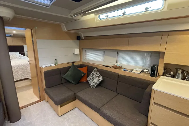  Yacht Photos Pics Luxurious interior of 2018 Hanse 588 yacht with cozy seating and modern design.