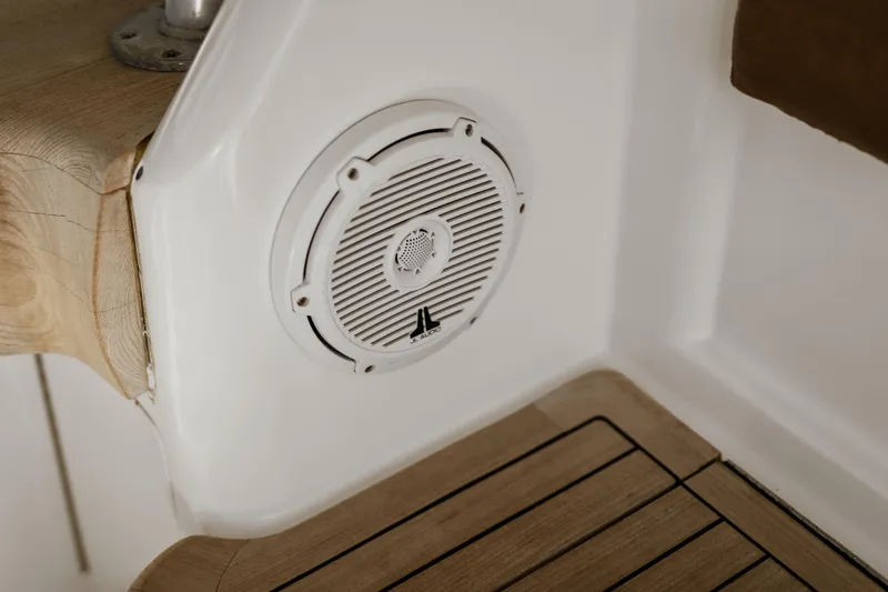 Unleashed Yacht Photos Pics Speaker on 2007 Viking 56 Convertible yacht with wooden and white interior.