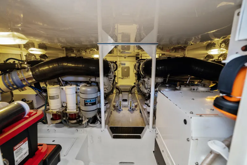 Unleashed Yacht Photos Pics Engine room of 2007 Viking 56 Convertible yacht, showcasing machinery and components.