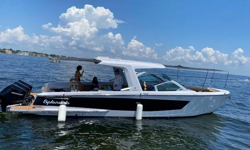  Yacht Photos Pics 2021 Aviara AV36 OB boat on water, featuring sleek design and spacious deck.