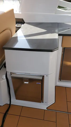  Yacht Photos Pics 2021 Aviara AV36 OB boat interior with sleek countertop and built-in storage.