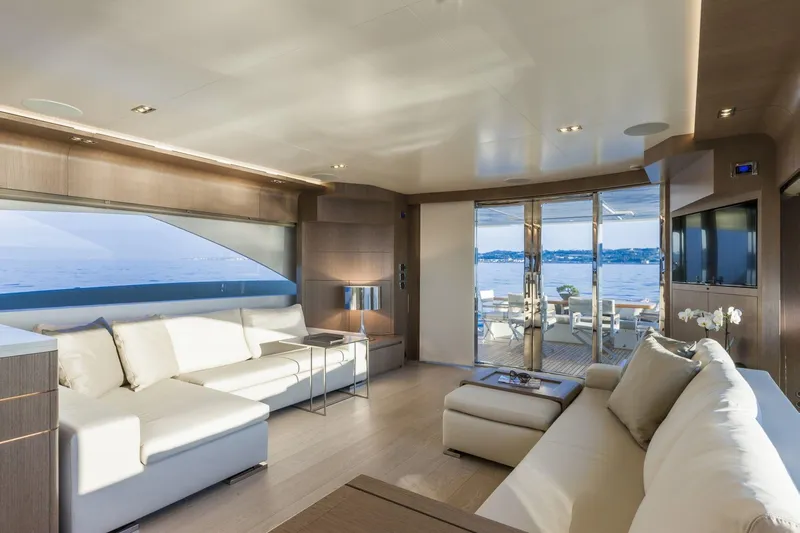  Yacht Photos Pics Luxurious interior of 2015 Dominator 800 yacht with elegant seating and ocean view.