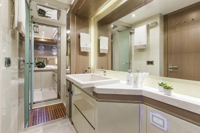  Yacht Photos Pics Luxurious bathroom interior on 2015 Dominator 800 yacht, featuring modern fixtures and elegant design.