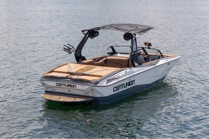  Yacht Photos Pics 2025 Centurion Nv233 boat on water, featuring sleek design and modern amenities.