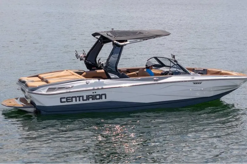  Yacht Photos Pics 2025 Centurion Nv233 boat on water, featuring sleek design and modern amenities.