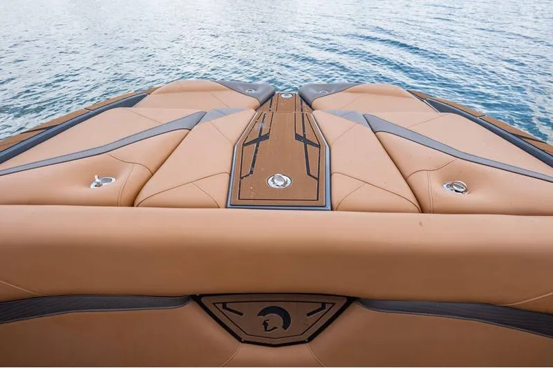  Yacht Photos Pics Luxury Centurion Nv233 boat deck, 2025 model, with tan upholstery and sleek design on water.