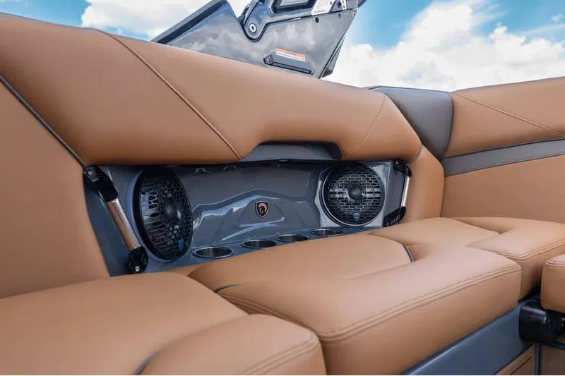  Yacht Photos Pics Luxurious brown leather seating with built-in speakers in a 2025 Centurion Nv233 boat.