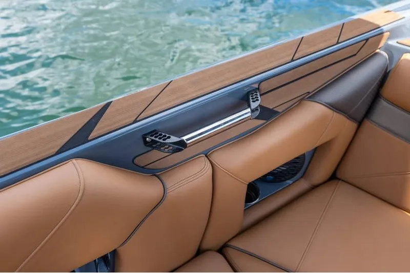  Yacht Photos Pics Luxurious interior of 2025 Centurion Nv233 boat with tan leather seating.