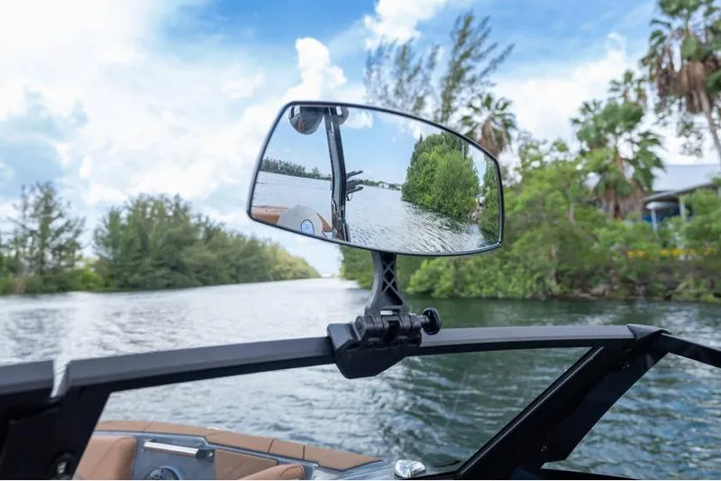  Yacht Photos Pics Rearview mirror on Centurion Nv233 boat reflecting scenic waterway, 2025 model.