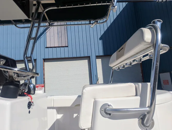  Yacht Photos Pics 2023 Bluewater Sportfishing 23t boat interior with white seating and metal framework.