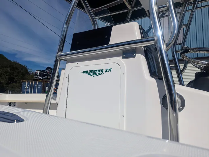  Yacht Photos Pics 2023 Bluewater Sportfishing 23t boat console with stainless steel railings.