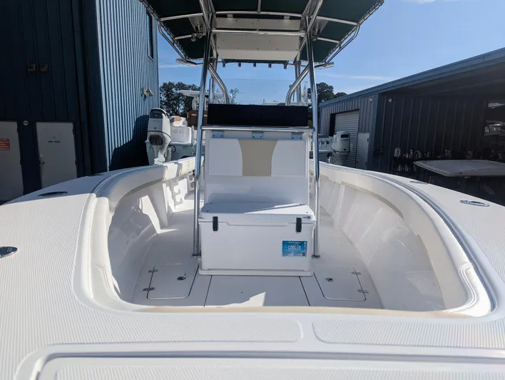  Yacht Photos Pics 2023 Bluewater Sportfishing 23t boat interior with seating and storage.