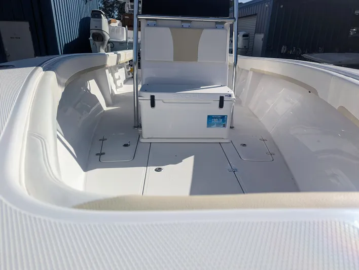  Yacht Photos Pics 2023 Bluewater Sportfishing 23t boat interior with seating and storage.