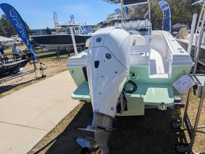  Yacht Photos Pics 2023 Bluewater Sportfishing 23t boat displayed outdoors with powerful outboard motor.