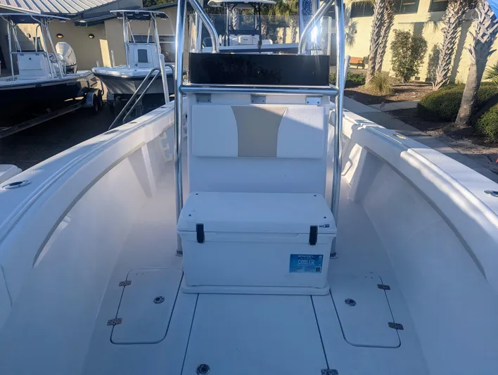  Yacht Photos Pics 2023 Bluewater Sportfishing 23t boat interior with seating and storage.