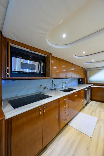 Jr Yacht Photos Pics Luxurious kitchen interior of 2004 Sea Force IX 82 Enclosed Bridge yacht.