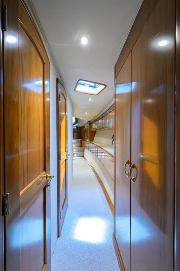 Jr Yacht Photos Pics Luxurious hallway inside 2004 Sea Force IX 82 Enclosed Bridge yacht, featuring elegant wood paneling.